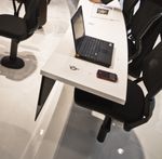 Laptop Charging Wirelessly on Conference Table