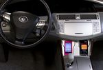 Phones Charging Wirelessly in Car Console
